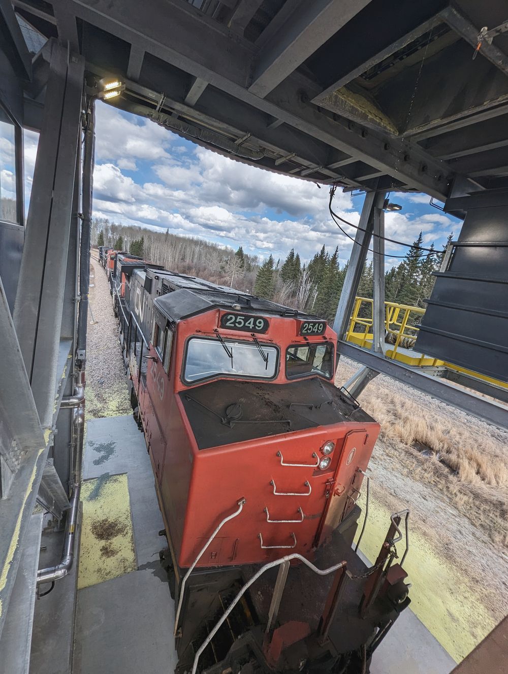 Trackmobile rail car mover inside the loading shed during startup